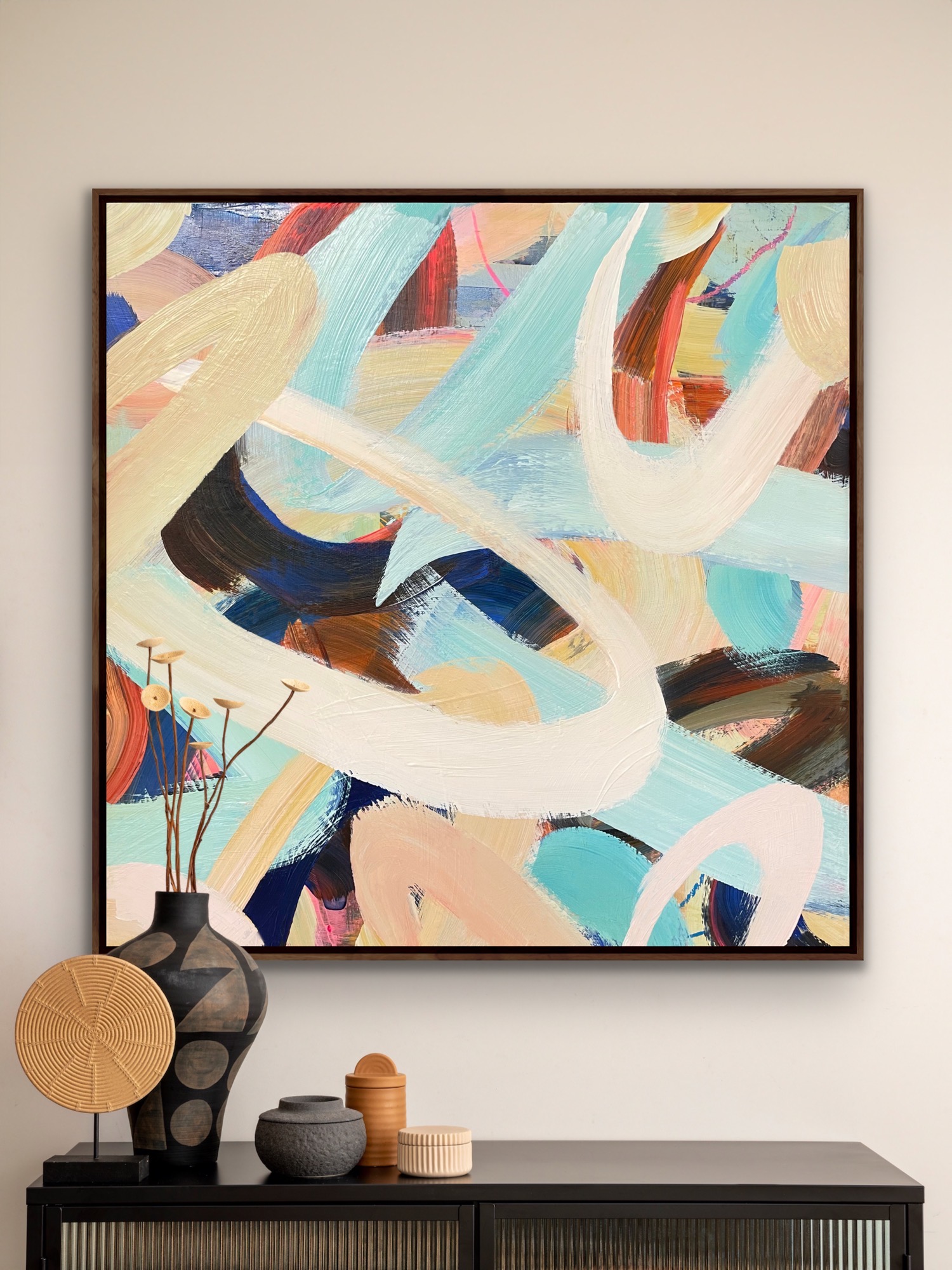 Twist & Shout art print on a wall above a black console
